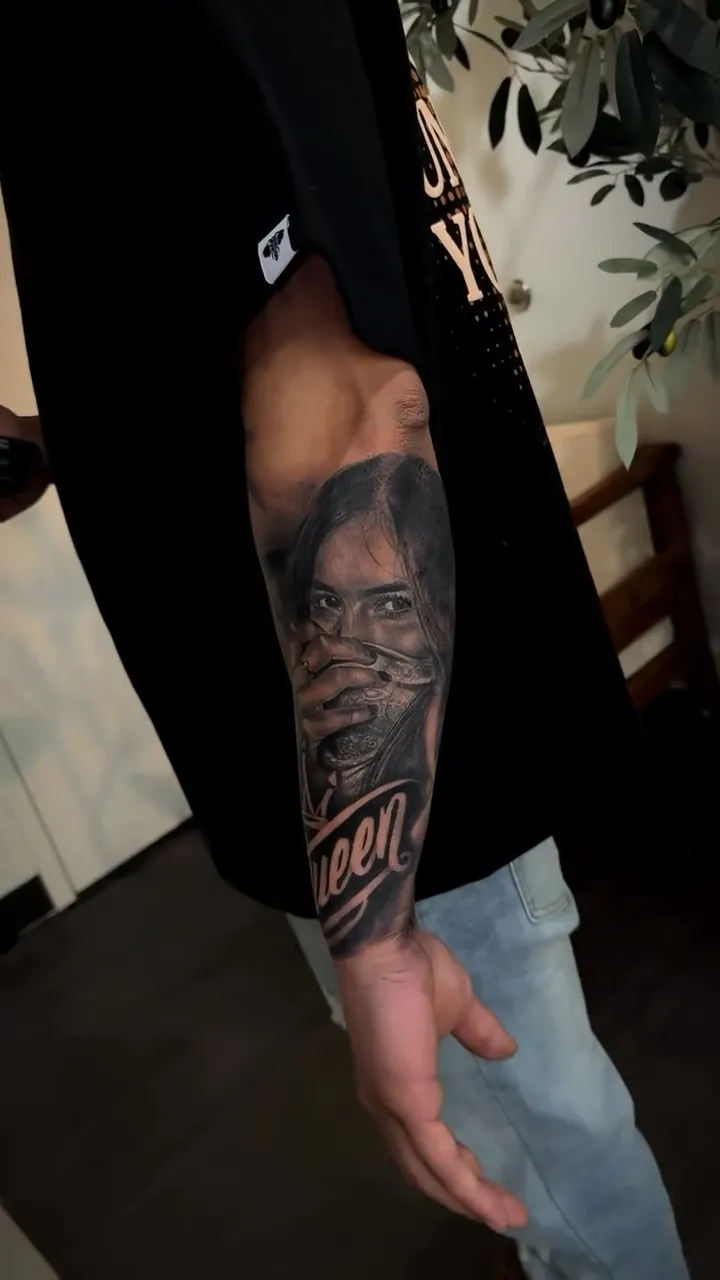 Realism portrait queen tattoo on forearm by Joan Martinez at Studio AZ Tattoo Minneapolis
